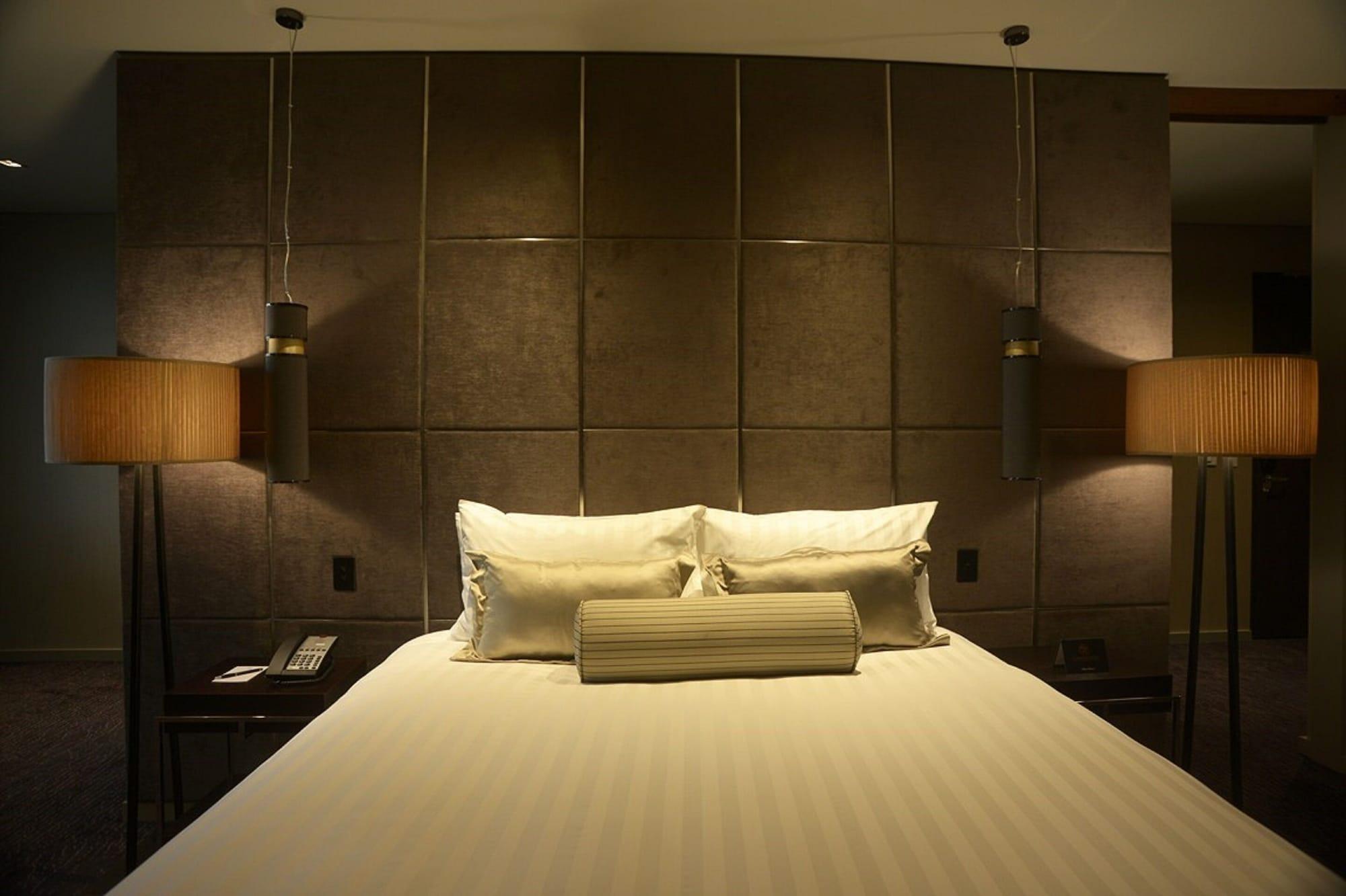 The Beetson Hotel Brisbane Exterior photo A bed with a large headboard